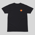 Black t-shirt with a small orange logo on a light gray background
