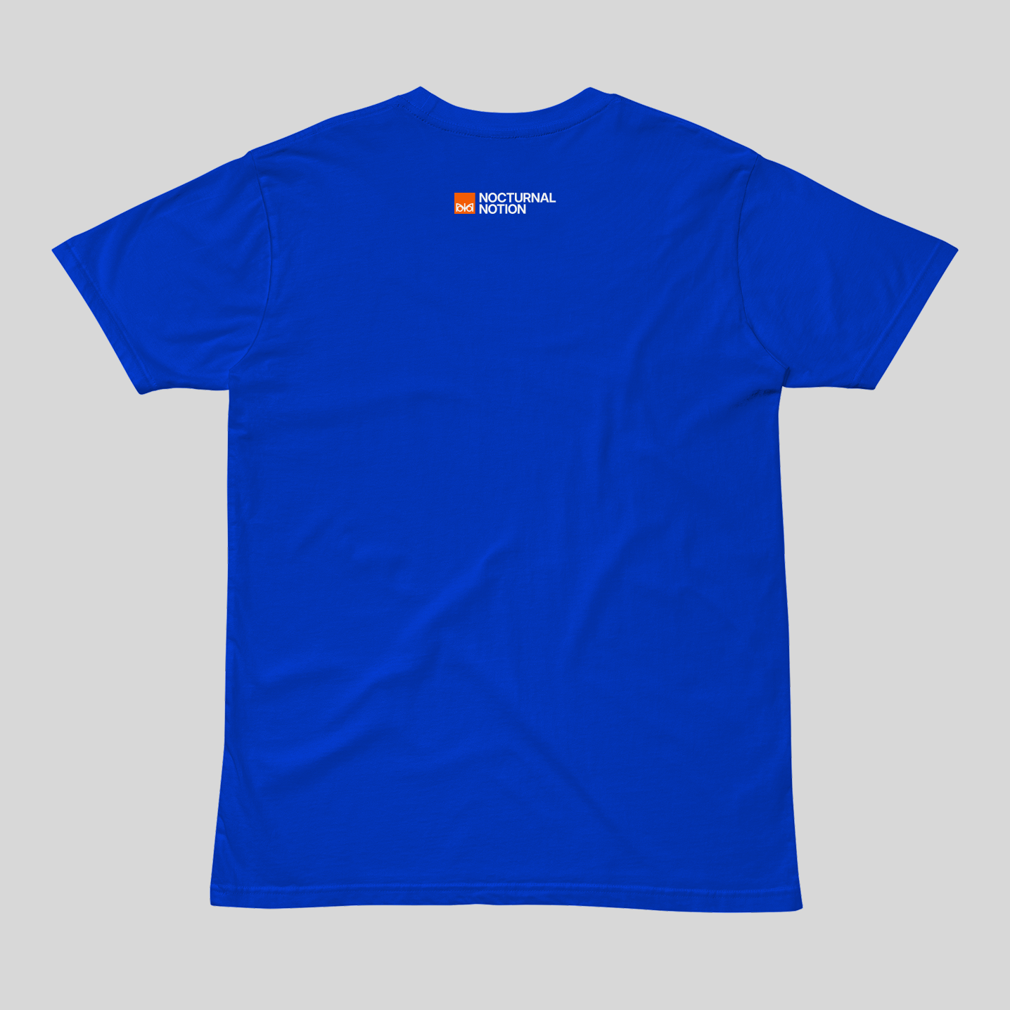Blue t-shirt with a logo on the chest against a gray background