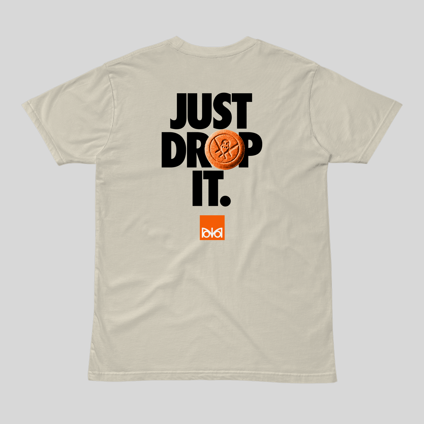 Beige t-shirt with 'Just Drop It' text and tablet graphic on a white background