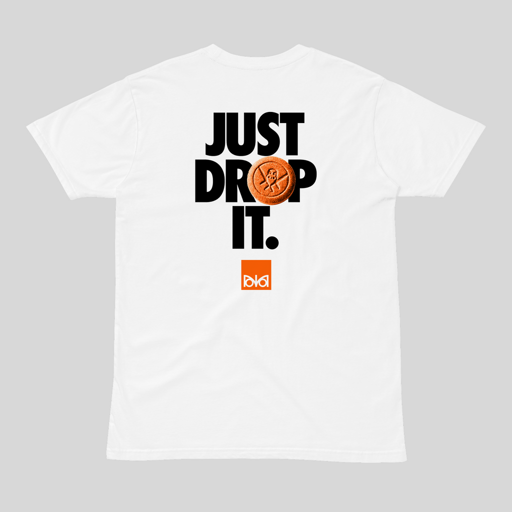 White t-shirt with 'Just Drop It' text and tablet graphic on a gray background